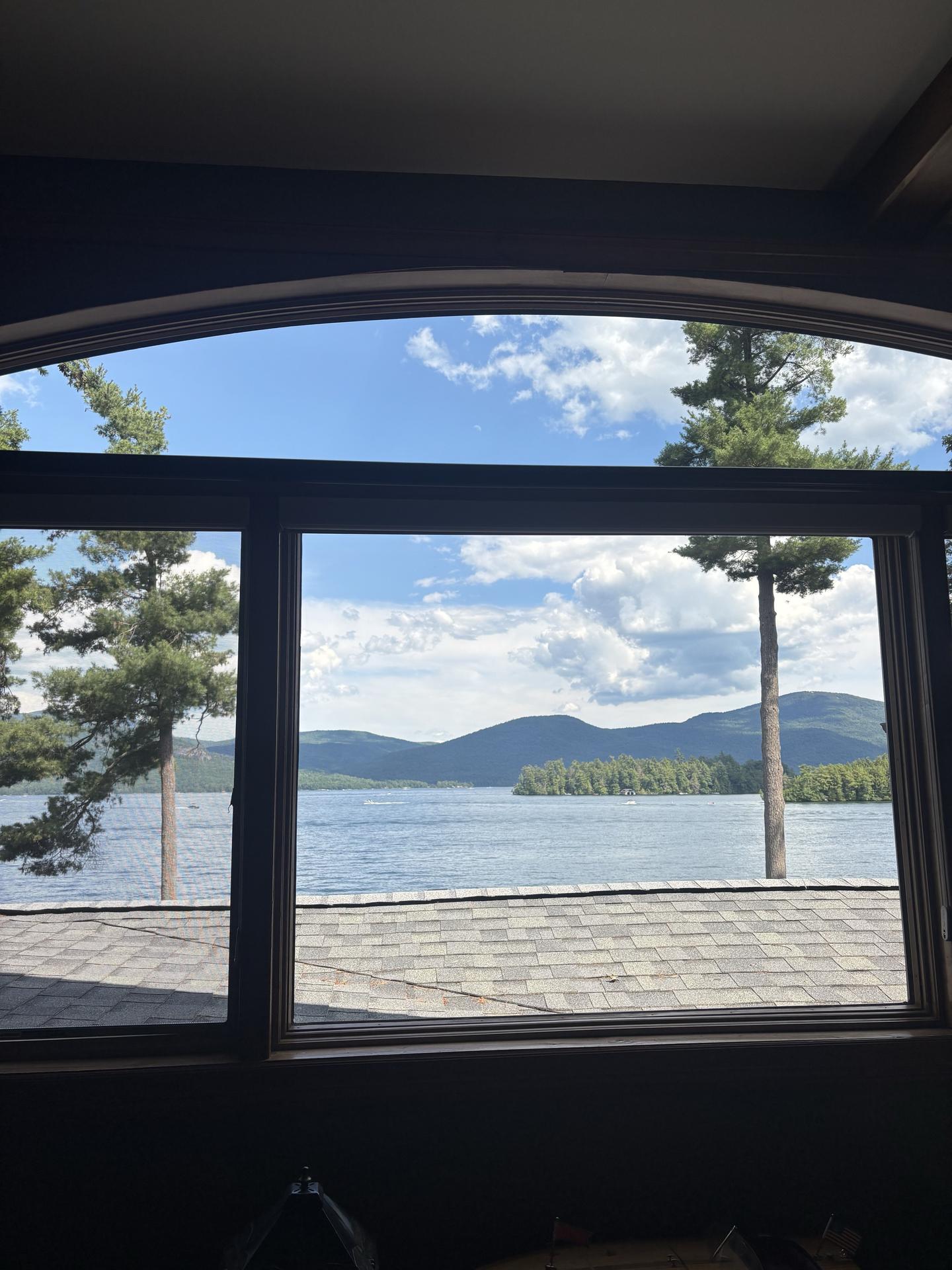 Crystal clear window overlooking Lake George after professional cleaning